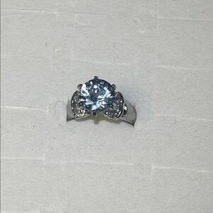 Elegant Silver Tone and Blue Gemstone Ring